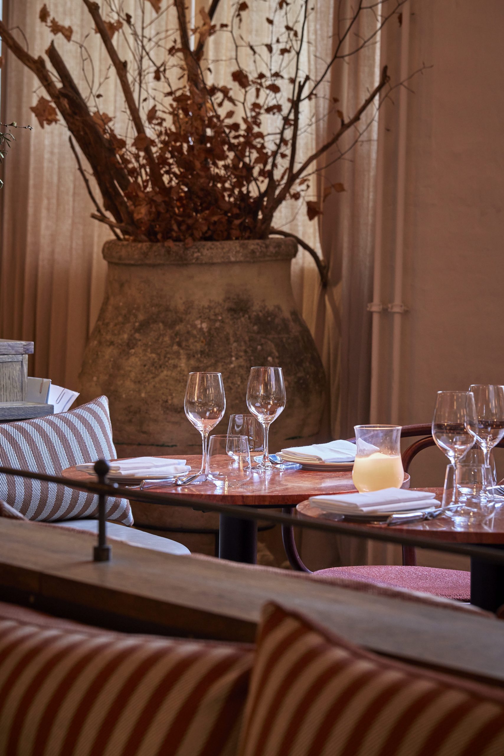 table with wineglasses at restaurant ambra